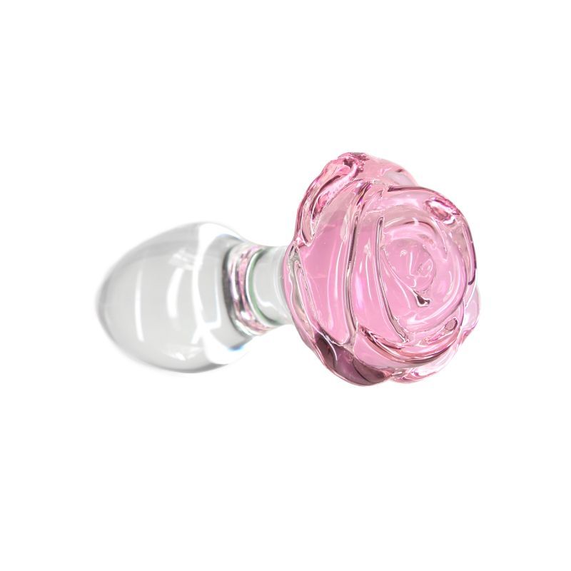 Luxurious glass anal plug featuring a pink rose design and clear gem for beauty and pleasure.