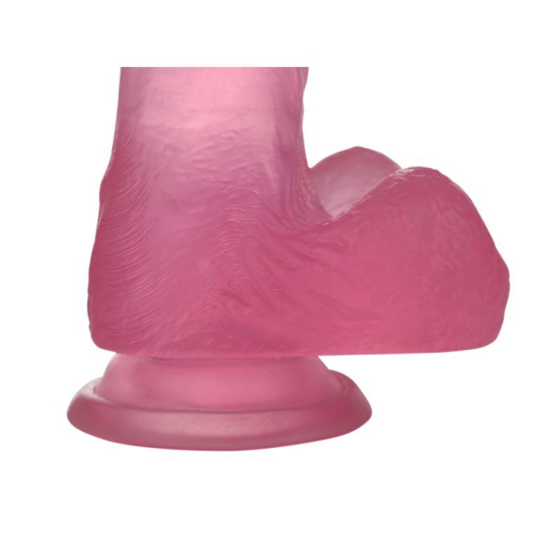 Close-up of small pink dildo with textured veined details and a wide suction base for versatile play.