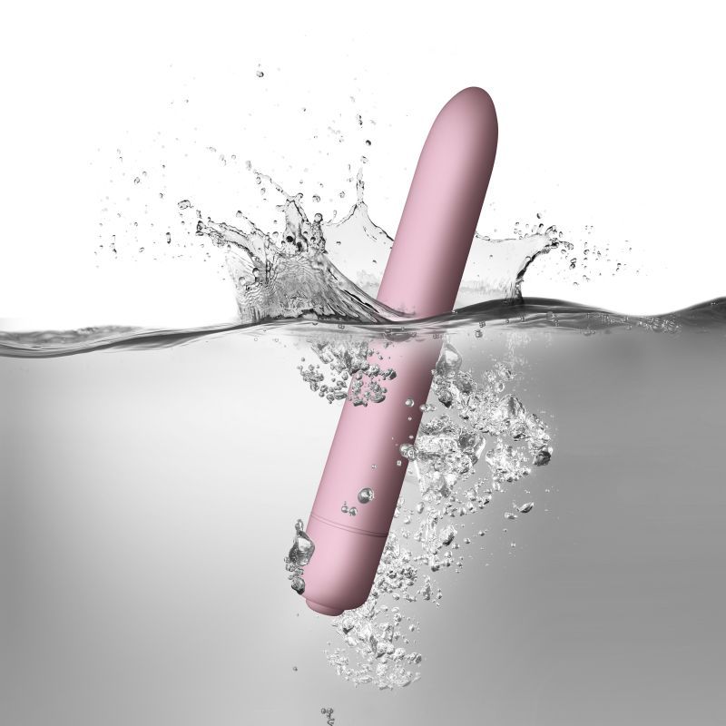 SugarBoo Bullet Vibe Pink submerged in water, showcasing its waterproof bullet vibrator feature and sleek design.