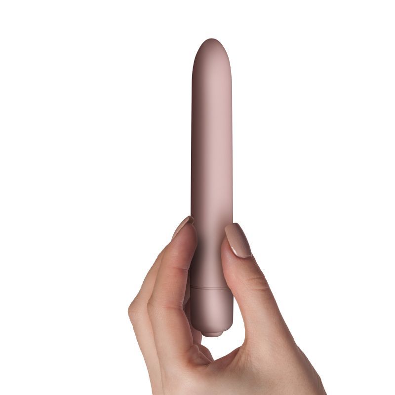 SugarBoo Bullet Vibe Blush held in hand, showcasing its design as a waterproof bullet vibrator.