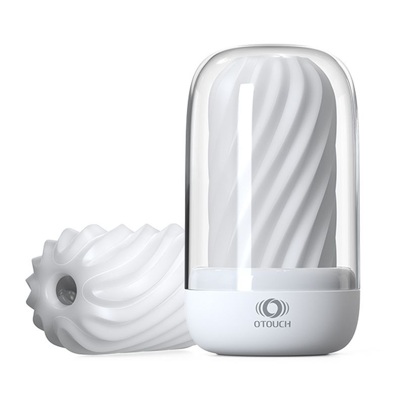 Heated male masturbator with UV sterilization, featuring a glossy white design and unique swirl texture.
