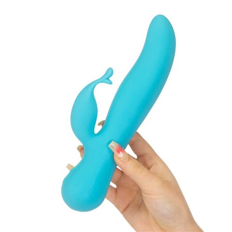 Kissing Swan Rabbit Vibrator in hand, featuring dual action rabbit vibrator design for enhanced pleasure.