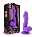 Ruse Juicy dildo displayed in packaging, featuring bright purple color and realistic shape for pleasure.
