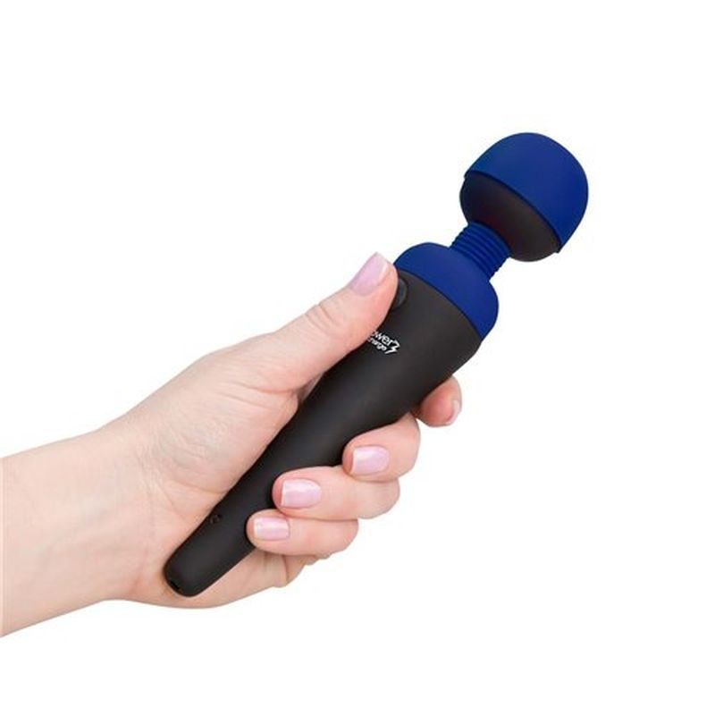 A person holding a PalmPower cordless massage wand in blue, showcasing its ergonomic design and powerful motor.