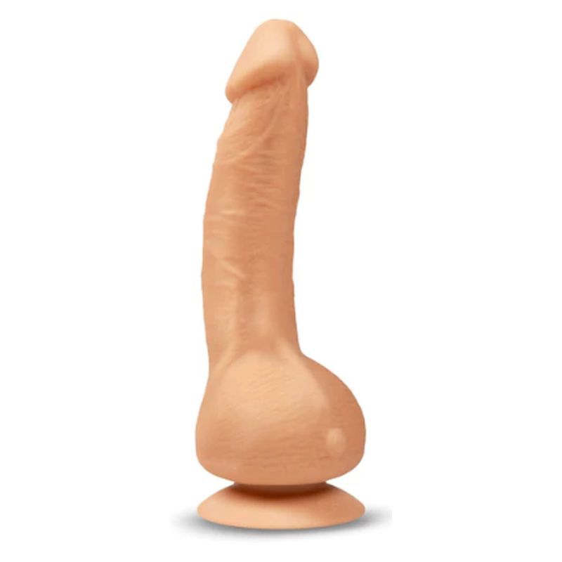 Realistic flesh-like sex toy with suction cup for enhanced pleasure and stimulation.
