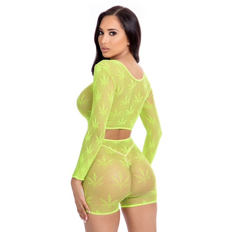 Model showcasing sheer leaf print short set in vibrant green, featuring a long-sleeved crop top and shorts.