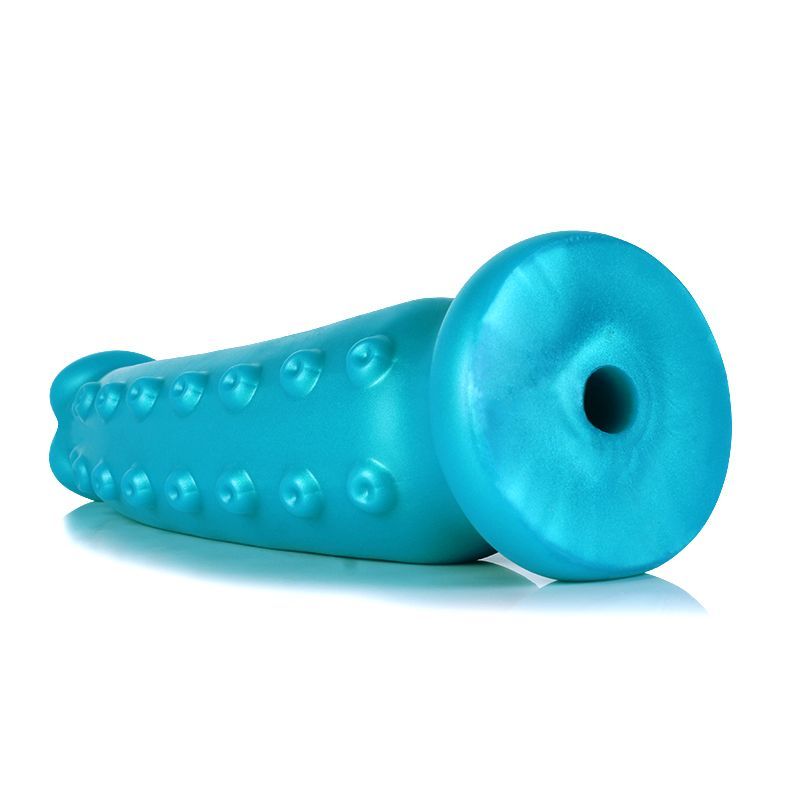OctoCock liquid silicone dildo medium in teal with suckers and Vac-u-lock base for attachment.