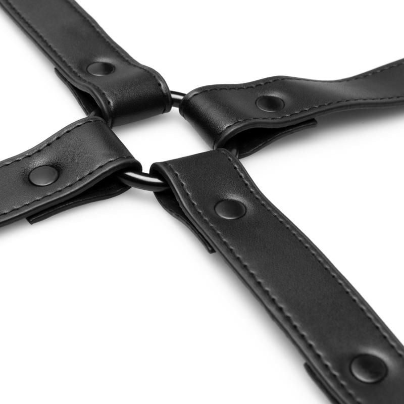 Close-up of the Hogtie with Hand and Ankle Cuffs made of durable faux leather and metal.