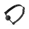 Breathable Silicone Ball Gag Black with adjustable faux leather strap for BDSM play and comfort.