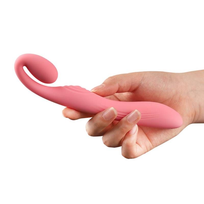 Hand holding the G-Snuggle Ultrasoft sprout-shaped unisex vibrator showcasing its flexible design.