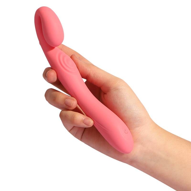 G-Snuggle ultrasoft sprout-shaped unisex vibrator held in hand showcasing its design and ergonomic flexibility.