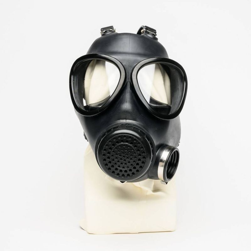 Military Adjustable Strap Rubber Gas Mask with clear lenses for versatile fit and comfort.