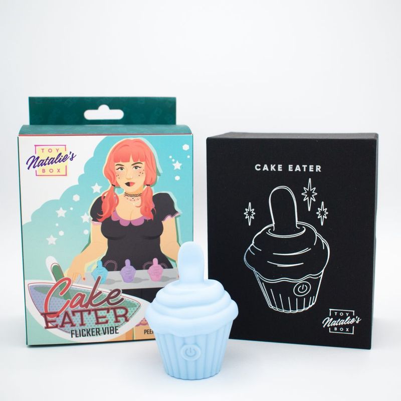Cake Eater Clit Flicker Stimulator in blue, featuring a cupcake design and discreet packaging.