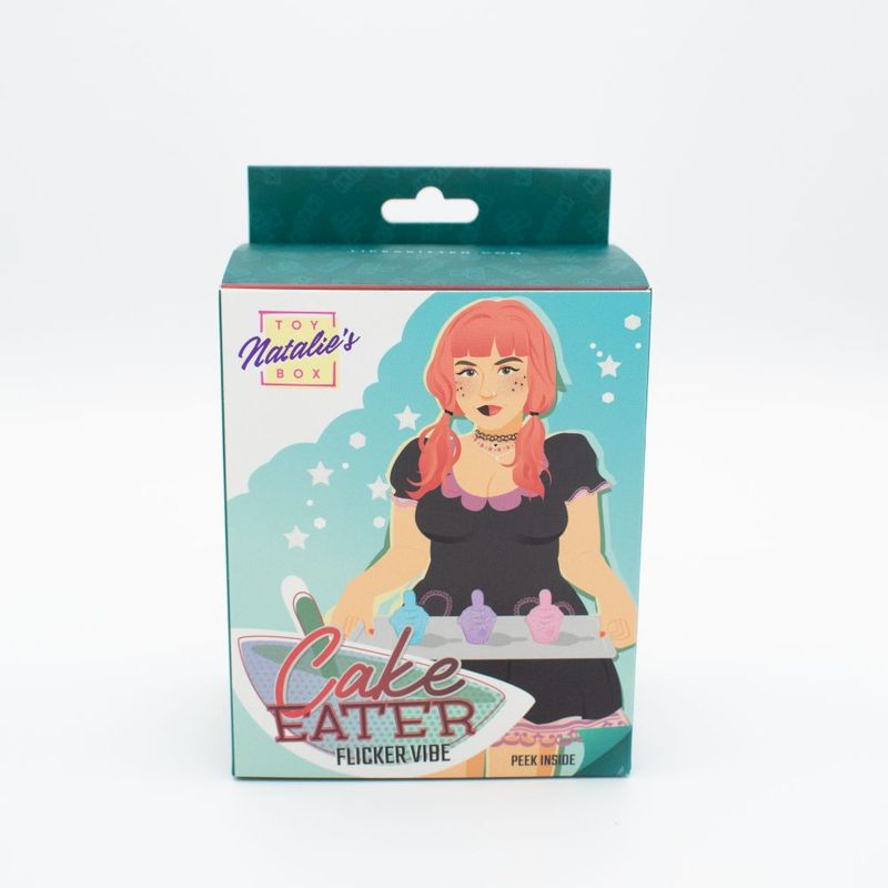 Cake Eater Clit Flicker Stimulator packaging showing a cartoon character and product name, perfect for solo or partner play.