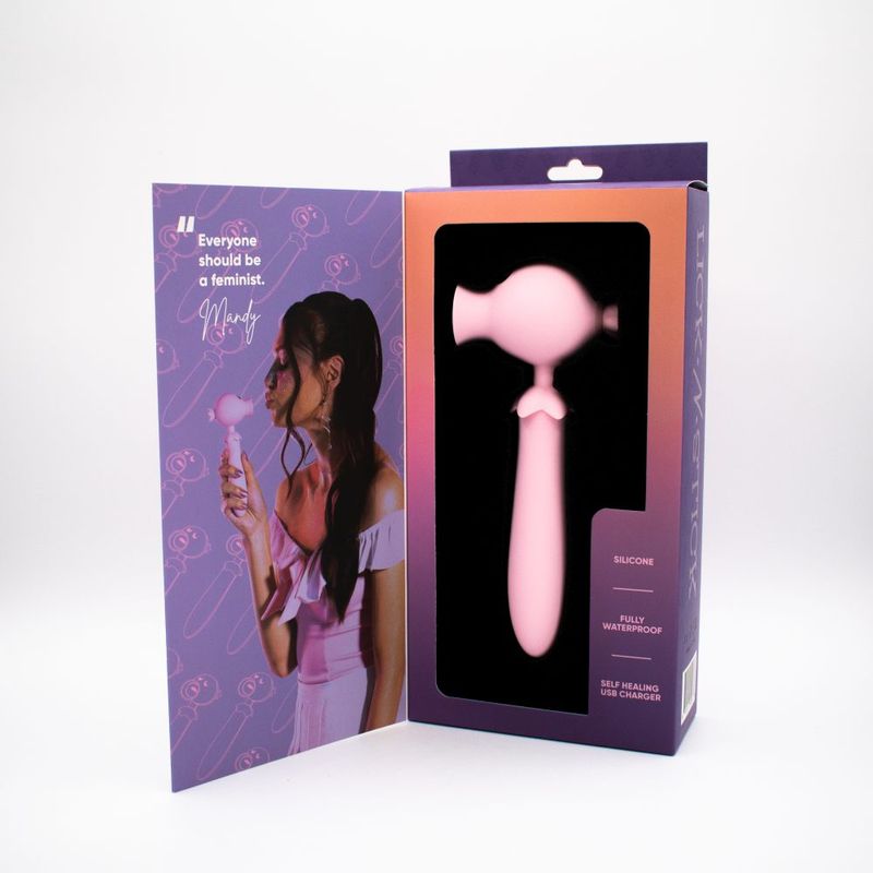 Lick N' Stick Clit Flicker G-Spot Vibrator packaging with a model, emphasizing its G-spot clitoral vibrator features.
