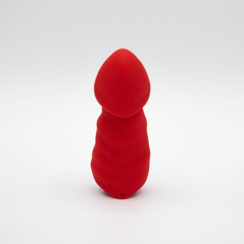 Little Red Bullet Vibrator, compact bullet vibrator, red silicone design with penis-shaped back side.