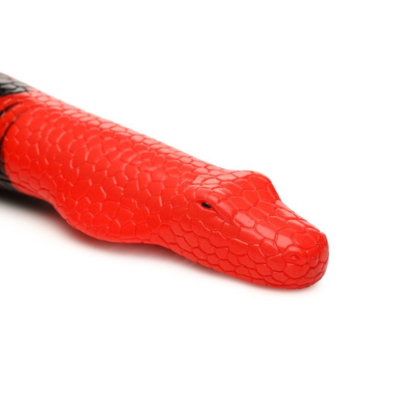 Large silicone cobra dildo close-up showing textured details and cobra head design.