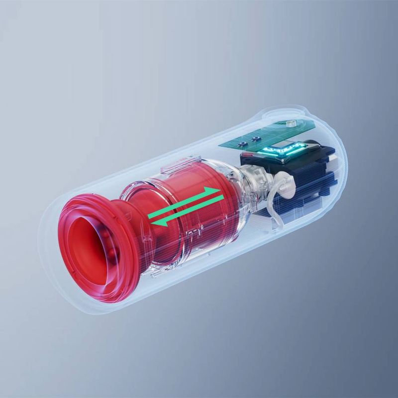 Close-up of the internal mechanism of a thrusting vibrating male masturbator featuring advanced technology.