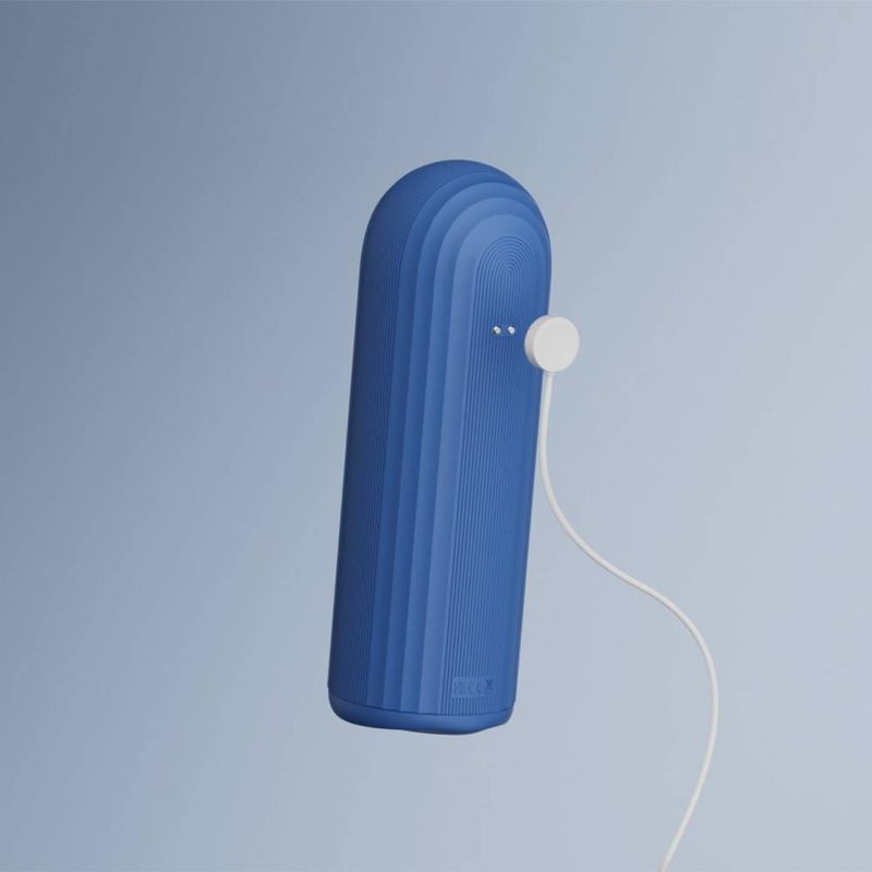 Submarine Submersible Thrusting Contracting Vibrating Masturbator in blue color with charging cable.