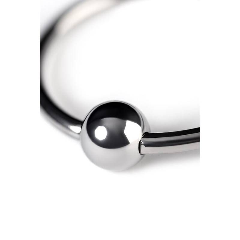Close-up of a 30mm metal penis head ring showcasing the shiny bead and smooth finish.