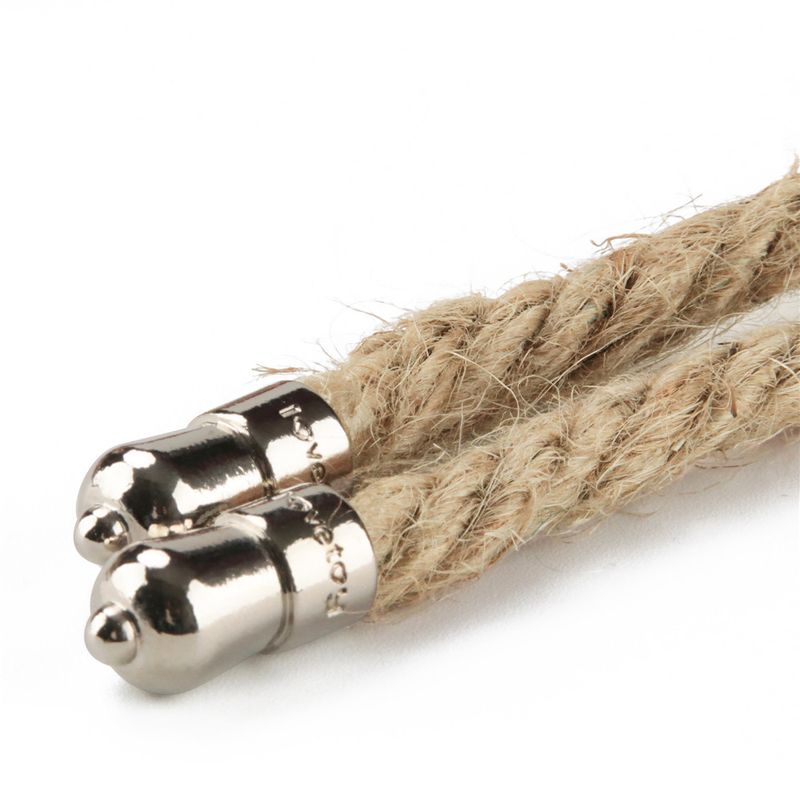 Close-up of the Rebellion Reign rustic hemp bondage rope with metallic tips and natural texture.