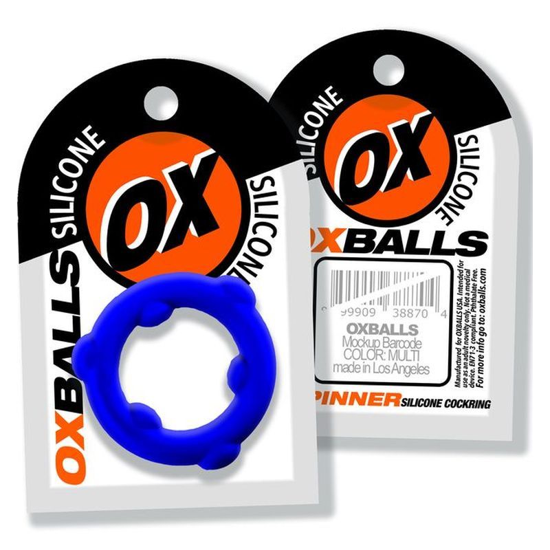 Oxballs SPINNER silicone cockring in blue packaging for intense play and maximum comfort.