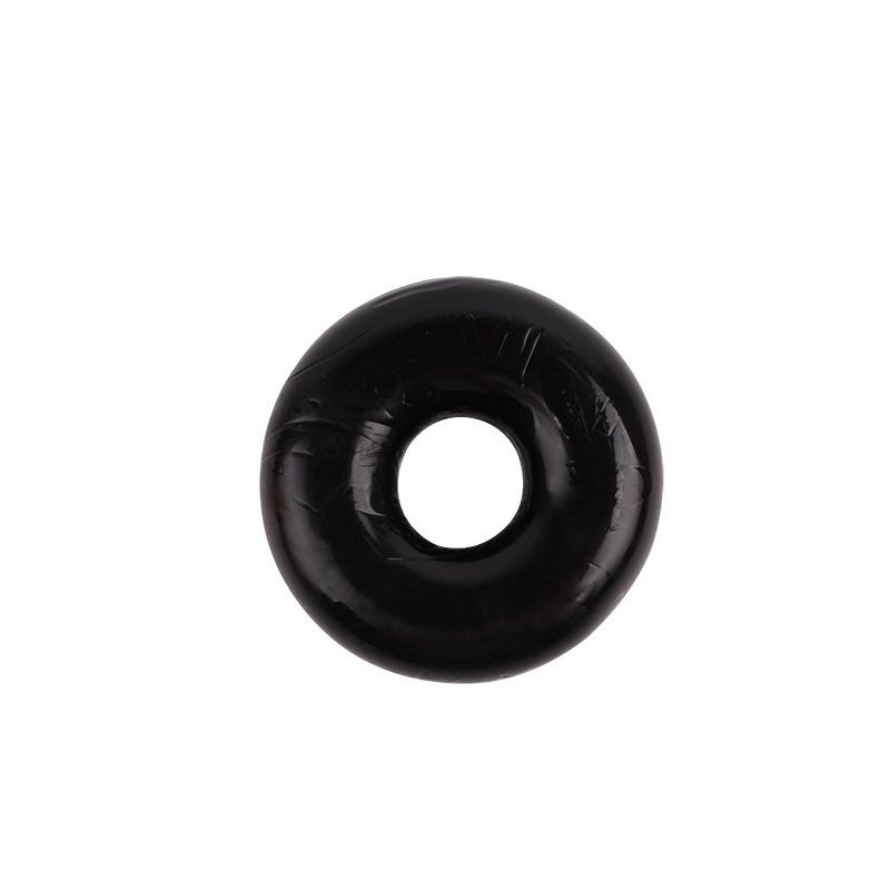 MEGA cock ring in black color, showcasing circular design and inner gap for enhanced performance.