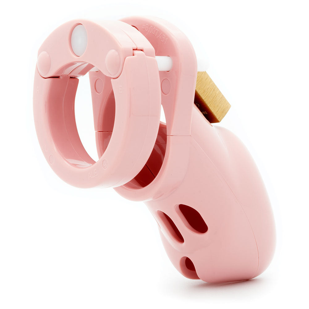 CB-3000 chastity cock cage kit in pink color, designed for comfort and security in chastity play.
