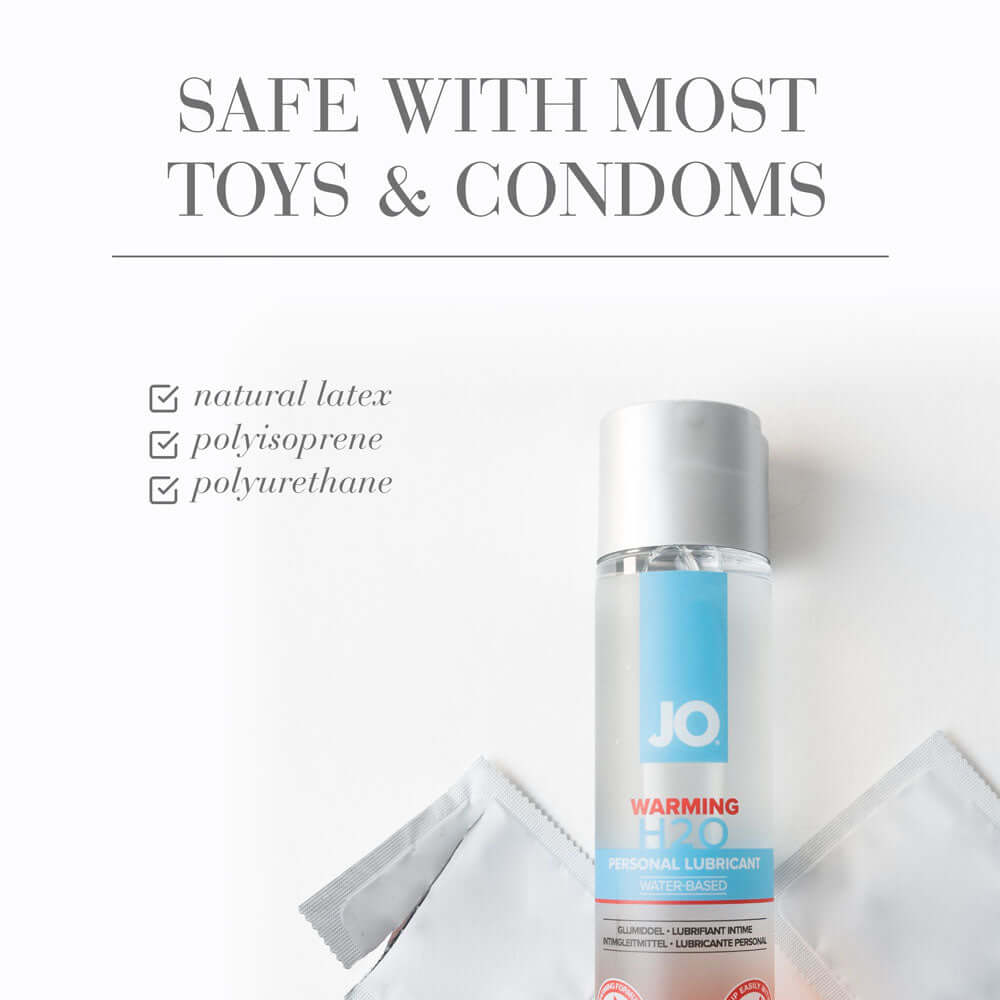 JO H2O Warming Lube 60 mL bottle with text on compatibility with condoms and toys, featuring water based warming lube.