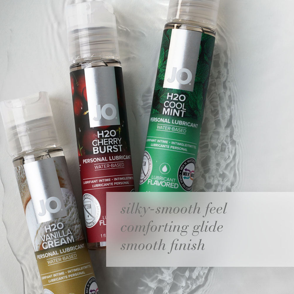 JO H2O Cherry Burst Lube - 120 mL - Cherry Flavoured Water Based Lubricant - 120 ml Bottle on display with other flavors.