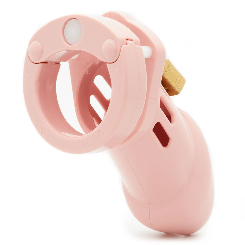 CB-6000 Chastity Cock Cage Kit -  -  3.25 Inch Cock Cage Kit in pink, essential for intimate play and restraint.
