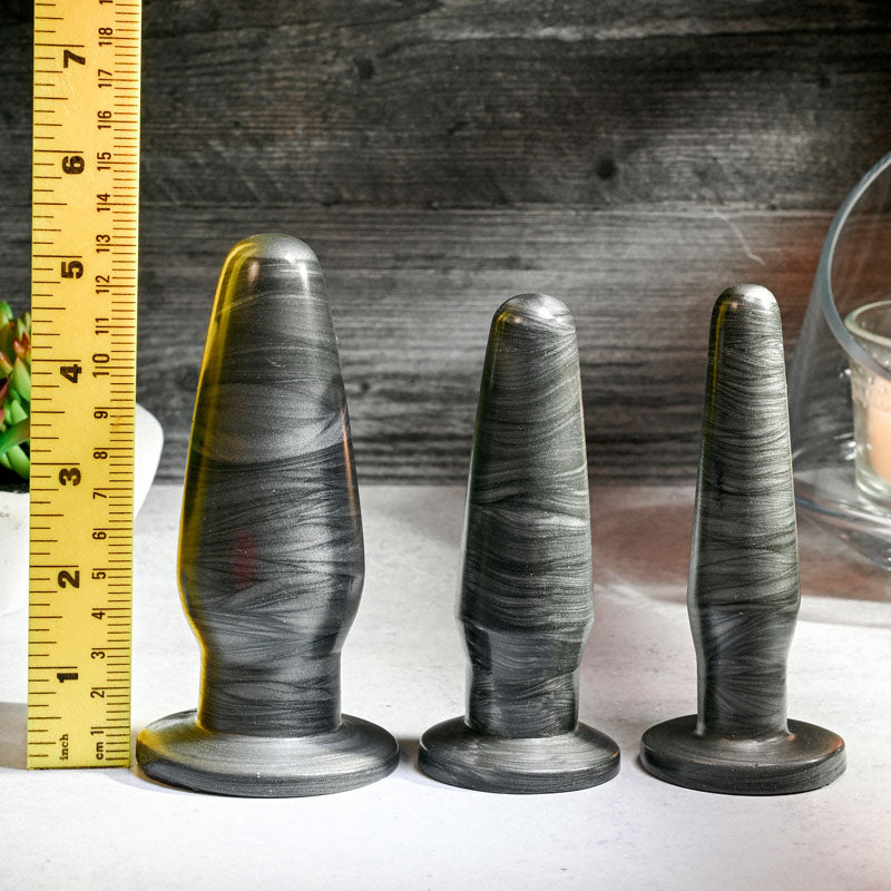 Adam & Eve ANAL ROCKETS TRAINER SET - Butt Plugs - Set of 3 Sizes displayed with a ruler for scale.
