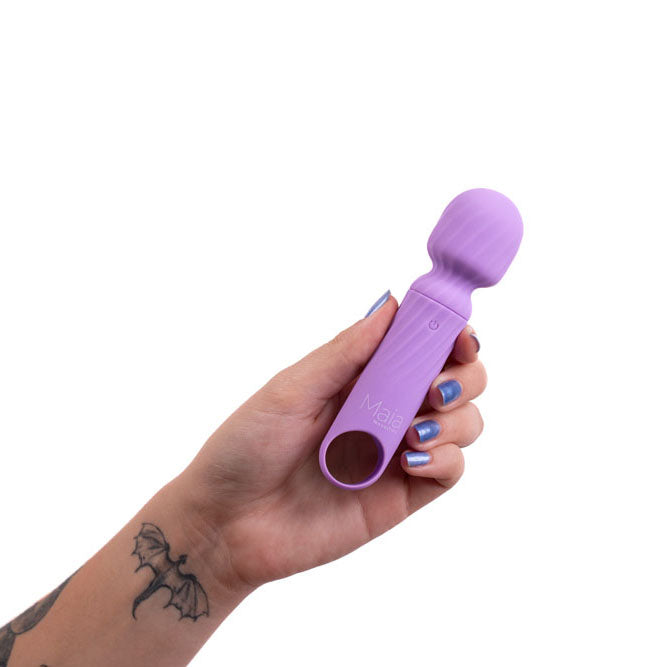 Maia DOLLY -  -  12.7 cm USB Rechargeable Massage Wand held in hand, showcasing its sleek design and color.