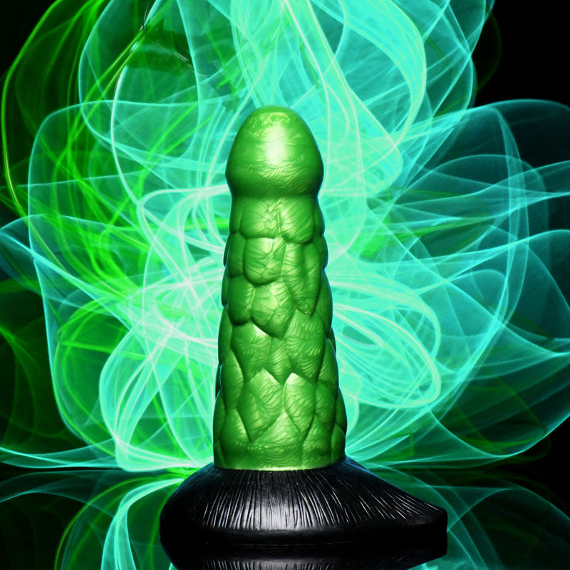 Creature Cocks Radioactive Reptile Thick Scaly Silicone Dildo - 19 cm Dildo in metallic green on a vibrant background.