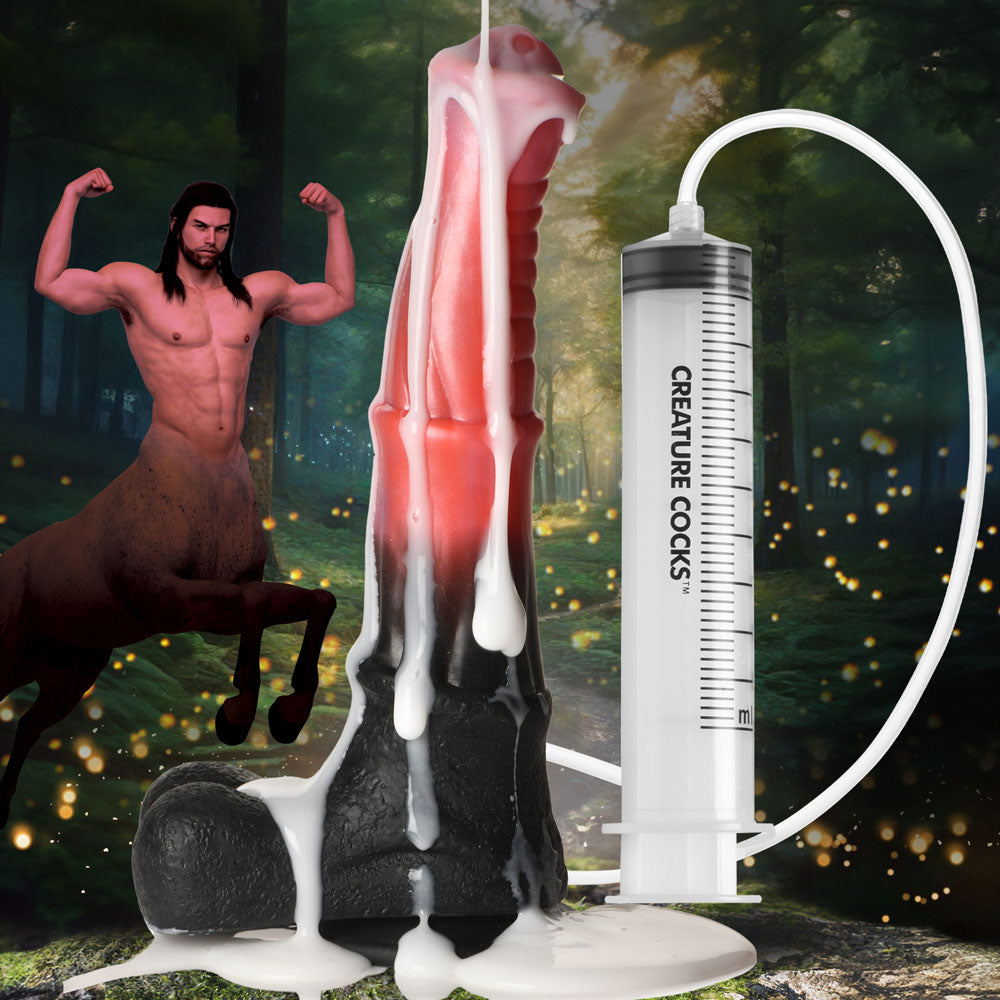 Creature Cocks Centaur Explosion - Pink/Black 24.5 cm Squirting Fantasy Dildo with pump in a enchanted forest setting.