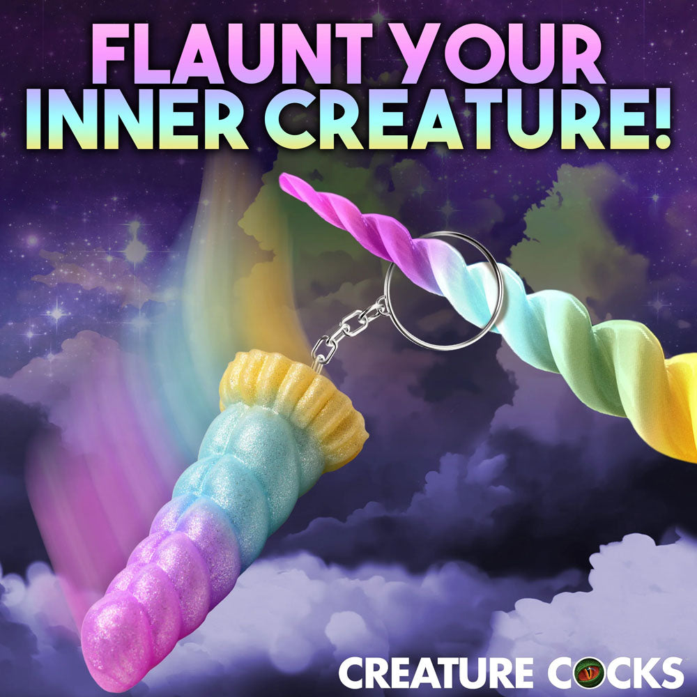 Flaunt your inner creature with the Creature Cocks Mystique Unicorn Keychain - Novelty Fantasy Dildo Keyring in pastel colors.