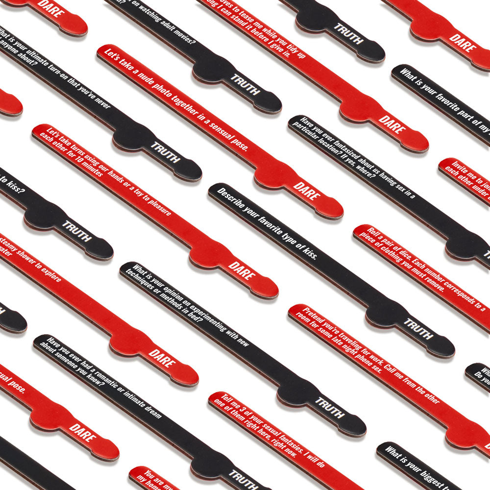 Frisky Pick A Pecker - Kinky Edition - Adult Truth Or Dare Game cards with Truth and Dare prompts on red and black strips.