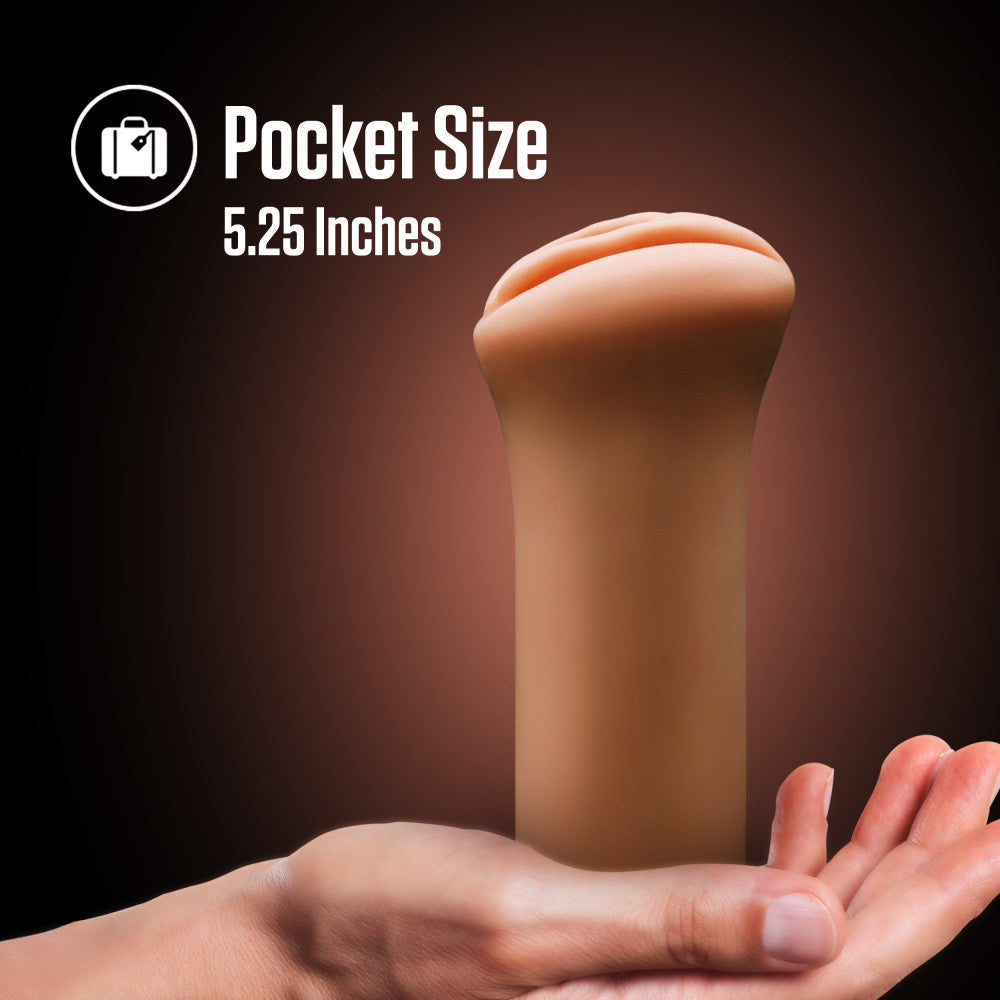 EnLust - Molly - Tan Vagina Stroker in hand showcasing its pocket size of 5.25 inches, perfect for intimate essentials for her.