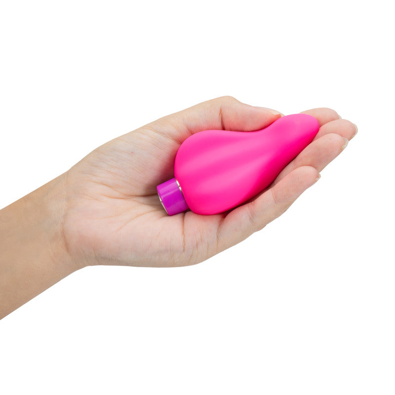 Aria Epic AF - Fuschia USB Rechargeable Stimulator held in hand, showcasing its compact design and vibrant color.