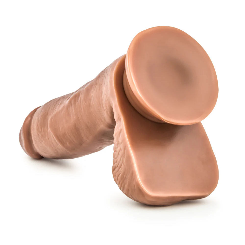 Coverboy - Manny The Fireman - Tan 17 cm (6.75'') Dong with realistic textures and strong suction cup base.