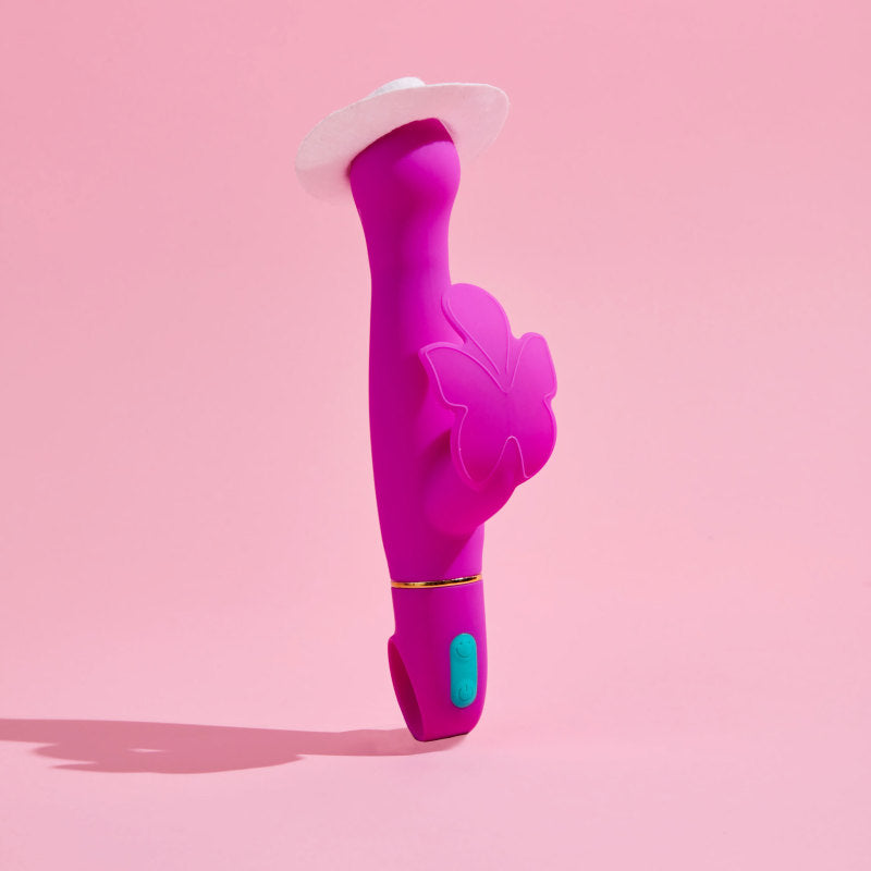 Aria Naughty AF - Plum 18.4 cm Butterfly Vibrator in vibrant pink on a pastel background, showcasing intimate essentials for her.