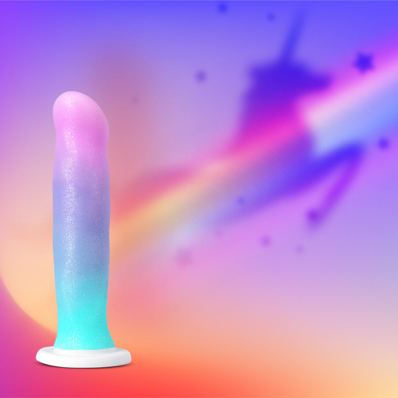 Avant - D17 - Lucky - Rainbow 20.3 cm Dong against a colorful, dreamy background with a unicorn silhouette.
