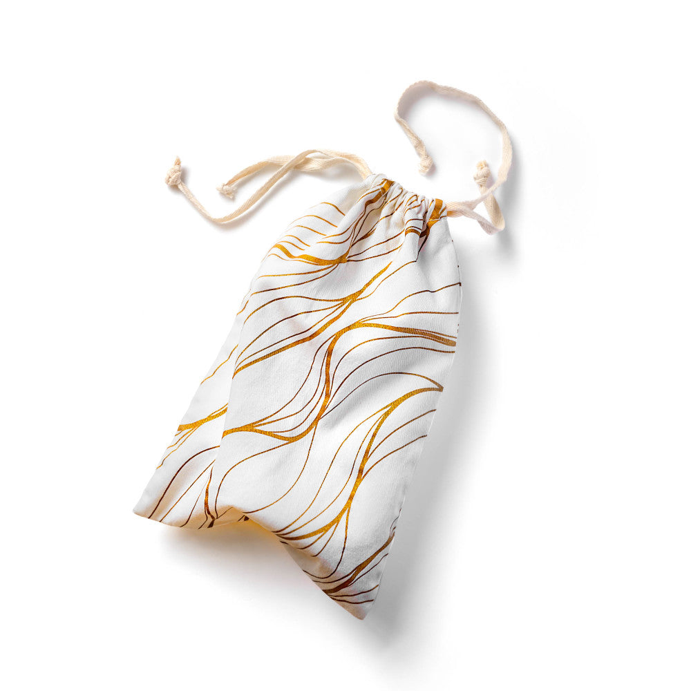 The Collection Embrace - Cotton Toy Storage Bag with elegant gold wave design and secure drawstring closure.