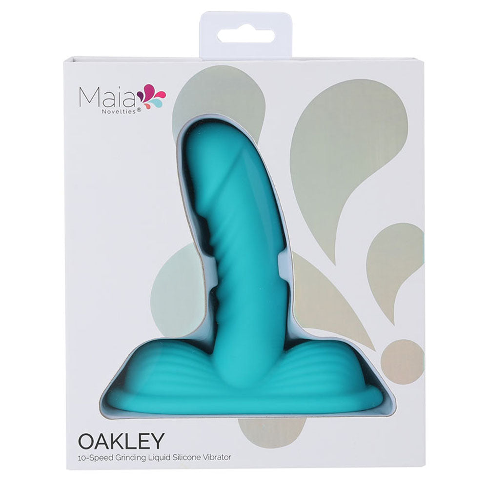 Maia OAKLEY -  -  USB Rechargeable Grinder Pad with 14 cm Vibrator in packaging, showcasing its sleek design.