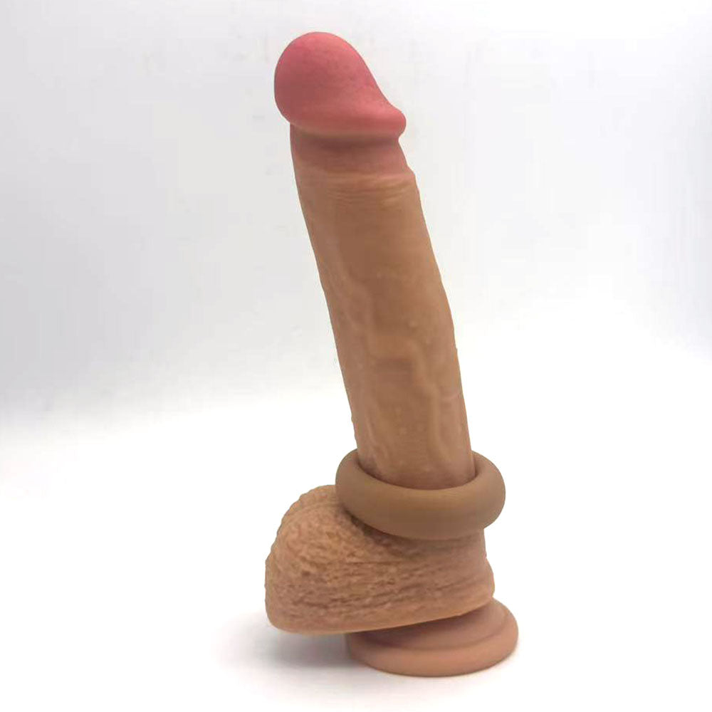 Maia GUNNER - Caramel - Tan Brown Cock Ring featured on a lifelike male sex doll, showcasing its nubbed interior design.