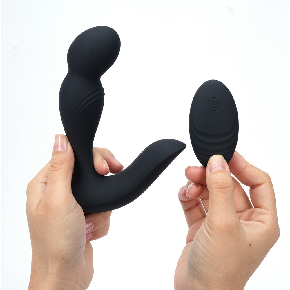 Maia COLTON -  -  USB Rechargeable Vibrating Prostate Massager with Wireless Remote in hands.
