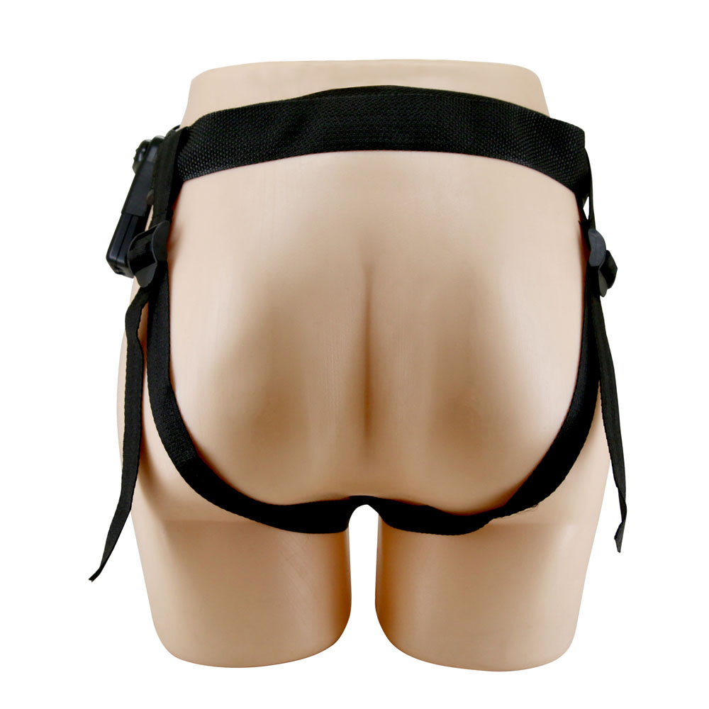 Vibrating hollow strap-on harness on a mannequin for secure and comfortable fitting.
