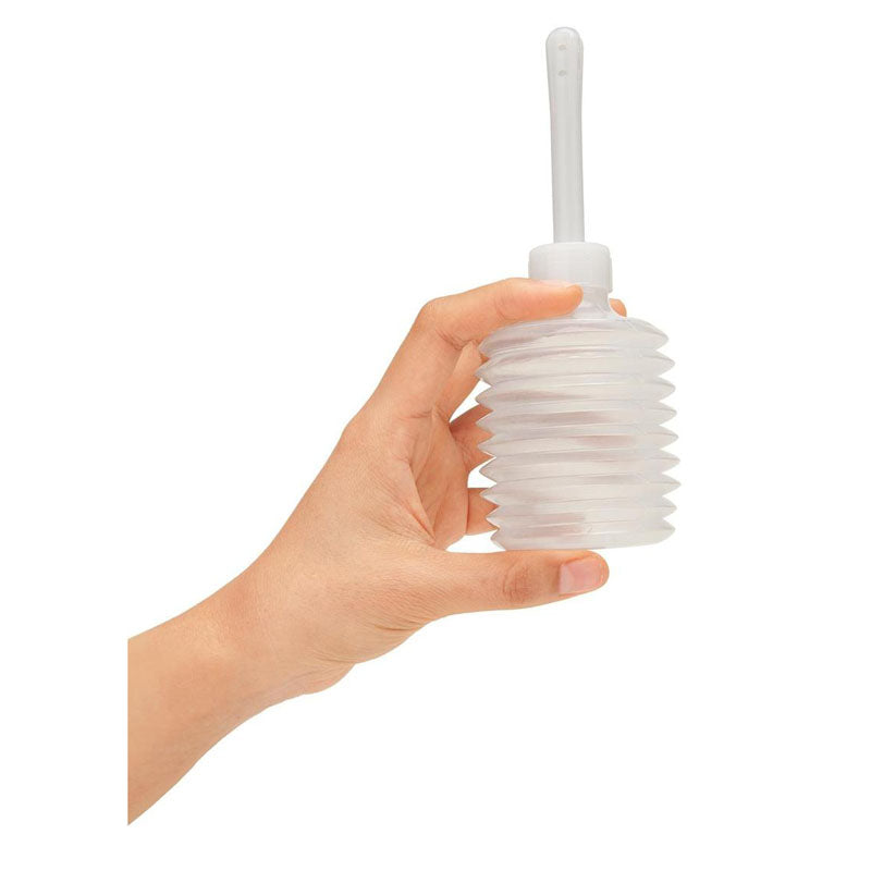 CleanScene 5 Piece Higginson Anal Douche Set - Includes Free Travel Douche Included in hand, showcasing flexible design.