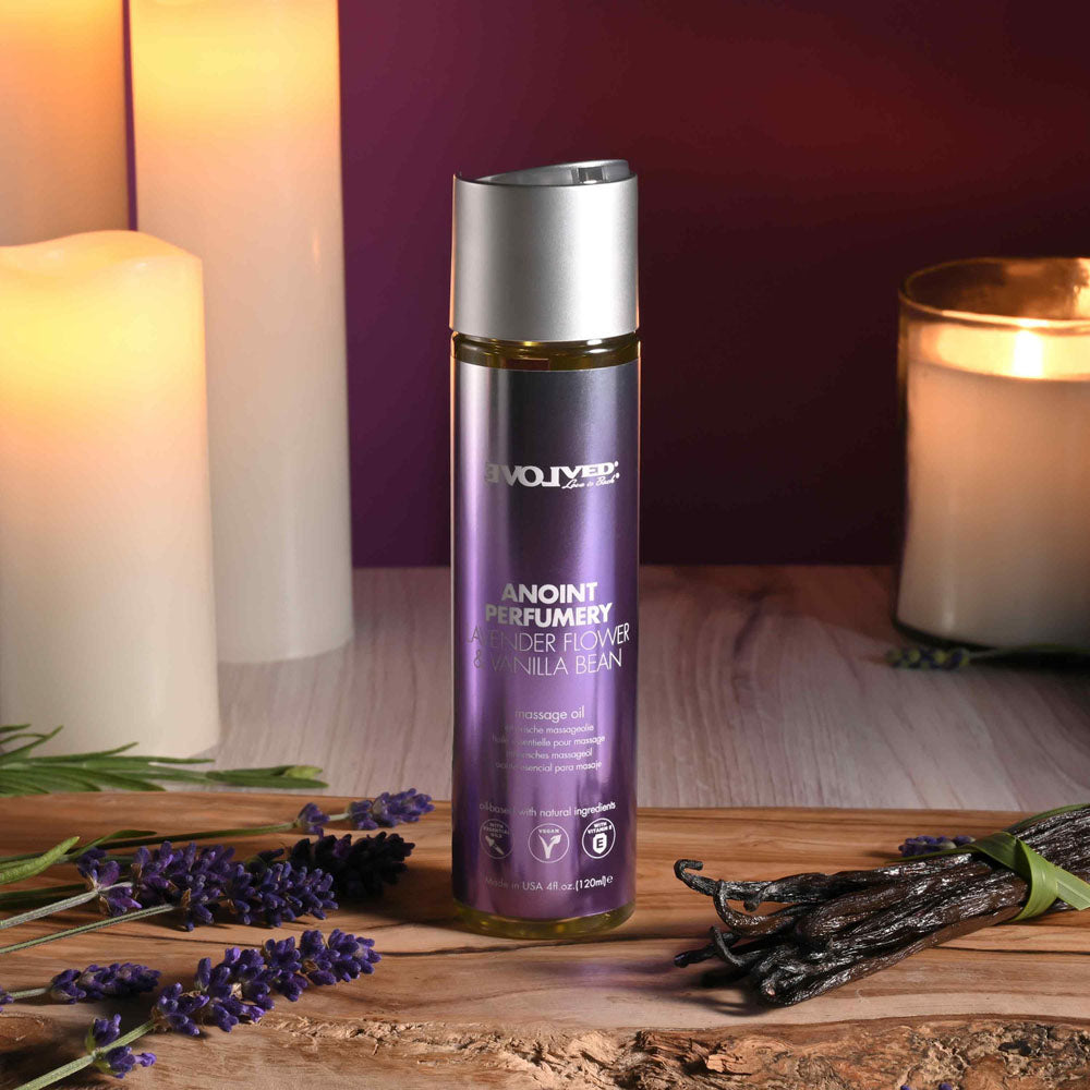 Evolved ANOINT PERFUMERY - Lavender Flower & Vanilla Bean - Lavender Flower & Vanilla Bean Massage Oil - 120 ml Bottle on a wooden surface.