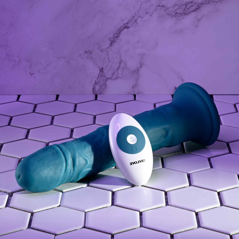 Evolved TSUNAMI -  18.4 cm USB Rechargeable Vibrating Dong with Remote Control on tiles.